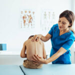 Pediatric Chiropractor performing adjustment on a child in Newmarket