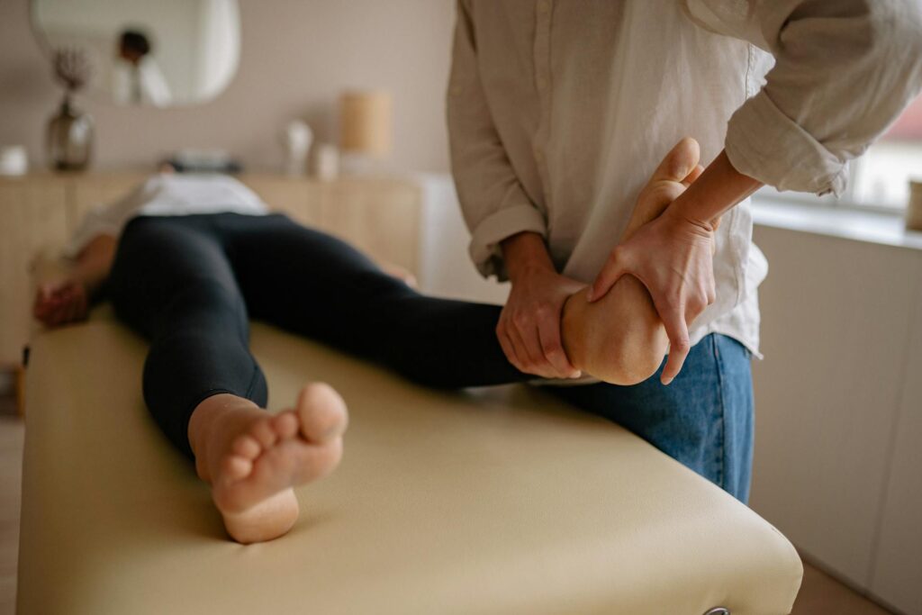 Chiropractor in Newmarket adjusting a patient’s foot for pain relief