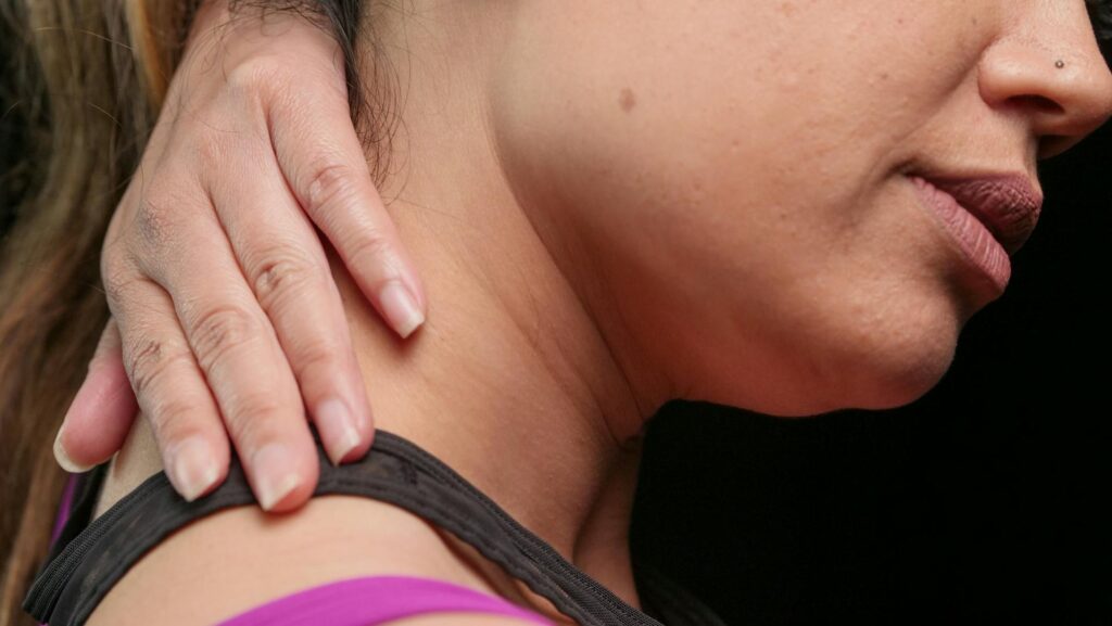 Chiropractor in Newmarket adjusting a patient's neck for whiplash recovery