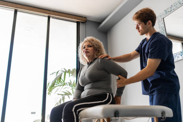Chiropractor in Newmarket adjusting patient with fibromyalgia