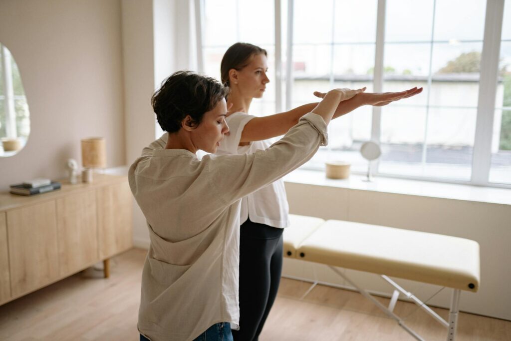 Chiropractor in Newmarket performing spinal adjustment to help patient regain energy naturally