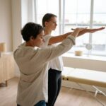 Chiropractor in Newmarket performing spinal adjustment to help patient regain energy naturally