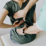 Chiropractor in Vaughan adjusting a patient's thoracic spine to improve digestive function