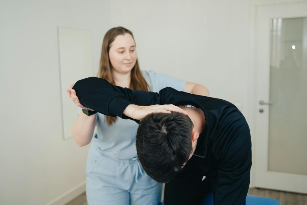 Chiropractor in Vaughan performing spinal adjustment for back pain