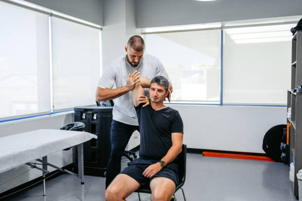 Chiropractor in Vaughan performing spinal adjustment for office worker