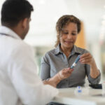 Naturopathic doctor consulting a patient in Newmarket clinic