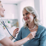 Naturopathic doctor discussing heart-healthy strategies with a patient in Newmarket