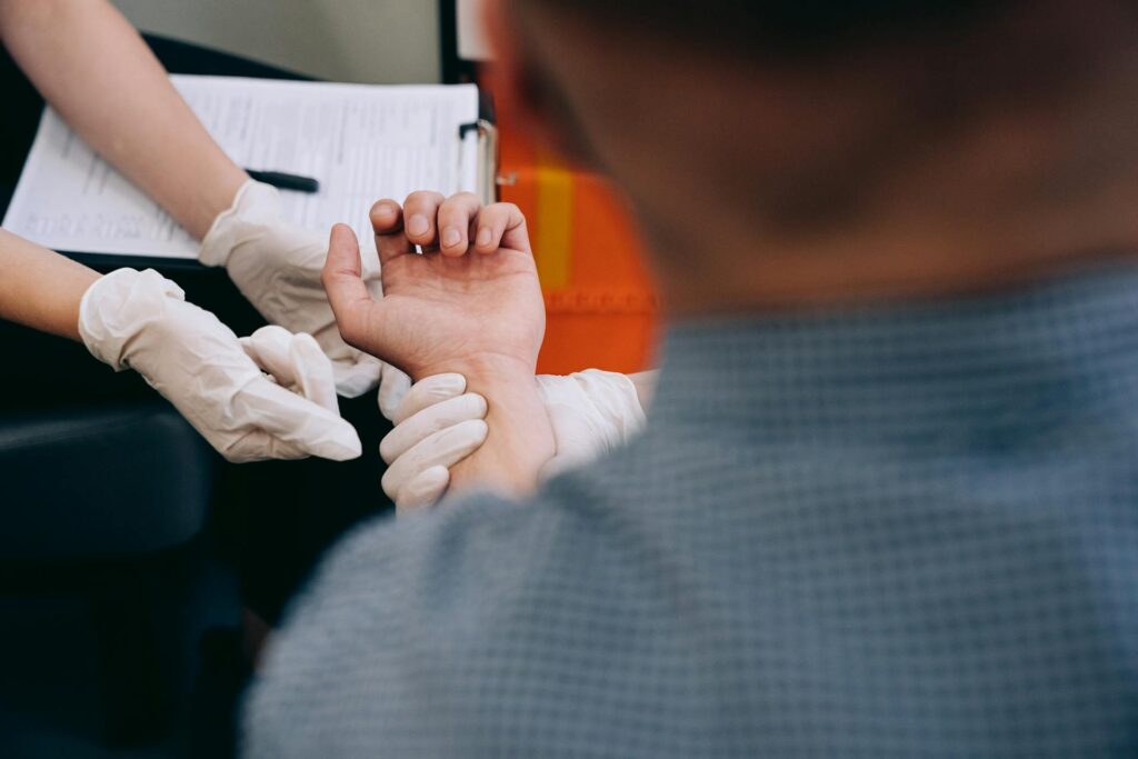 Physiotherapist in Vaughan assessing a patient hand pain
