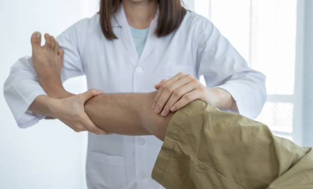 Physiotherapist treating patient with chronic pain at a Newmarket clinic