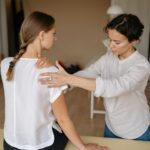 physiotherapist in Vaughan performing shoulder rehabilitation techniques