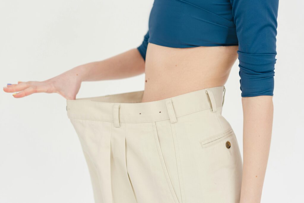 A naturopathic doctor in Newmarket discussing weight loss strategies with a patient