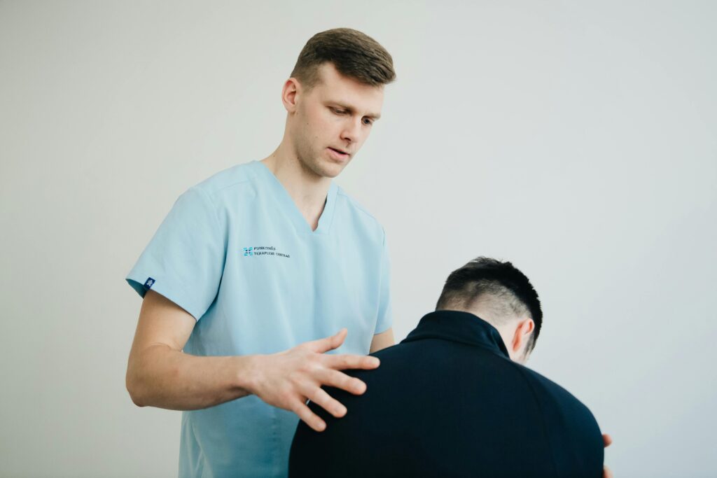 Chiropractor in Newmarket performing spinal adjustment for back pain relief