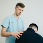 Chiropractor in Newmarket performing spinal adjustment for back pain relief