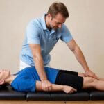 Chiropractor in Newmarket performing adjustments to improve nerve function and gut health