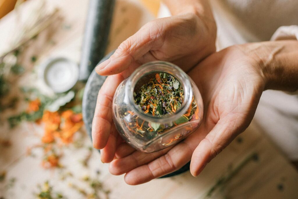 Naturopathic practitioner supporting a client's immune health with natural herbs in Newmarket