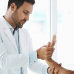 Newmarket physiotherapist performing hand therapy for pain relief and improved grip strength