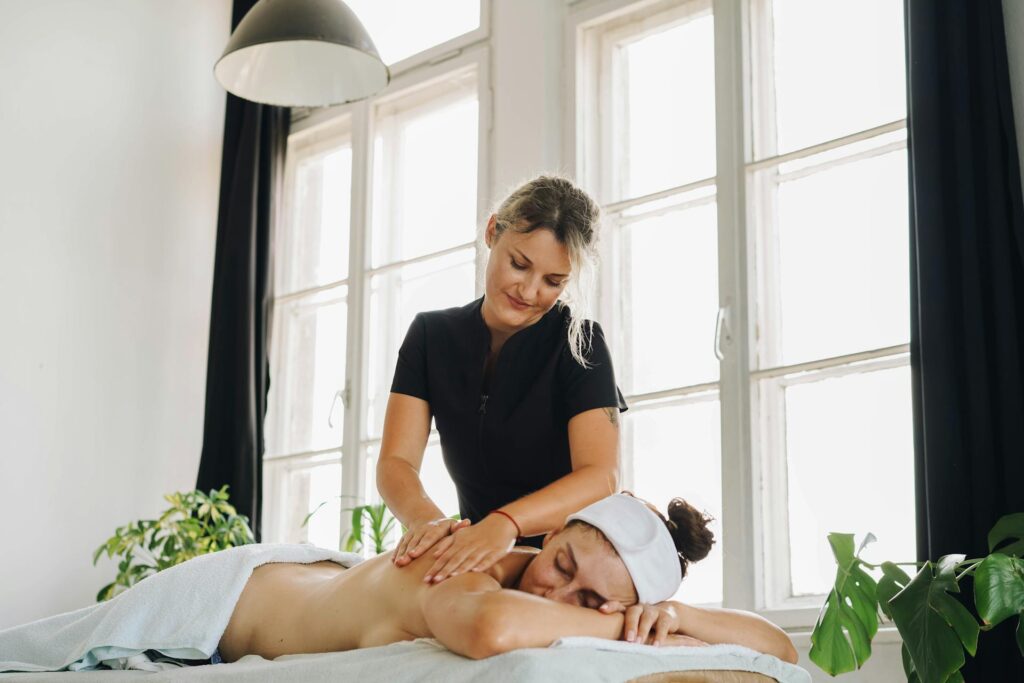 Office worker receiving massage therapy in Vaughan to relieve back pain
