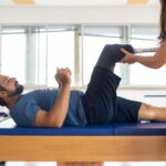 Physiotherapist guiding patient through post-car accident rehab in Vaughan clinic