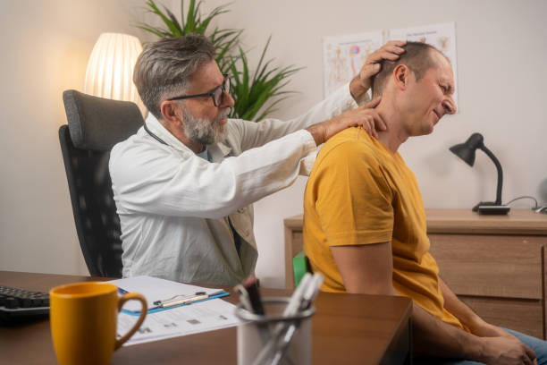 Professional chiropractor in Vaughan treating a patient with whiplash by performing a gentle neck adjustment