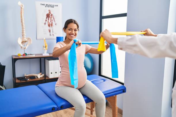 A pregnant woman receiving physiotherapy treatment in Newmarket for pelvic pain relief