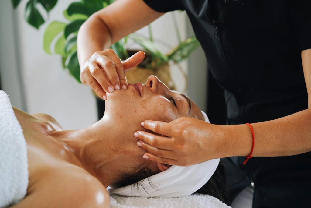 A registered massage therapist in Newmarket using calming techniques for stress relief