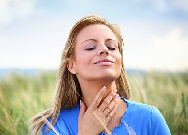A relaxed woman smiling with confidence after finding natural hormonal relief through naturopathy in Vaughan.