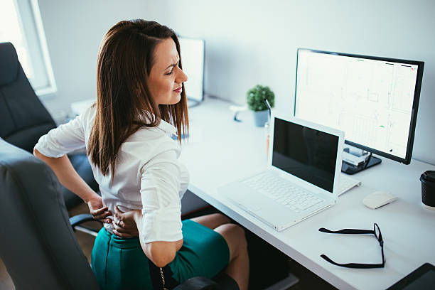 Chiropractor in Newmarket adjusting patient's spine to improve posture and cognitive function