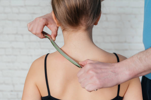 IASTM treatment for muscle pain relief at PhysioChiroWellness in Newmarket