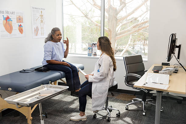 Naturopathic doctor in Vaughan consulting with a patient about chronic pain management.