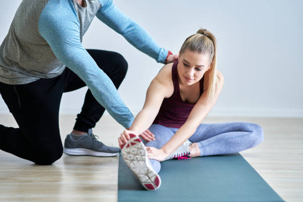 Patient receiving guided stretch from Vaughan physiotherapist at PhysioChiroWellness