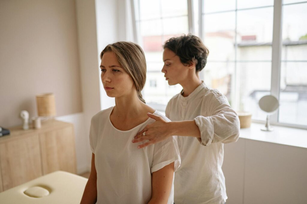 Physiotherapist in Vaughan guiding patient through posture correction exercises