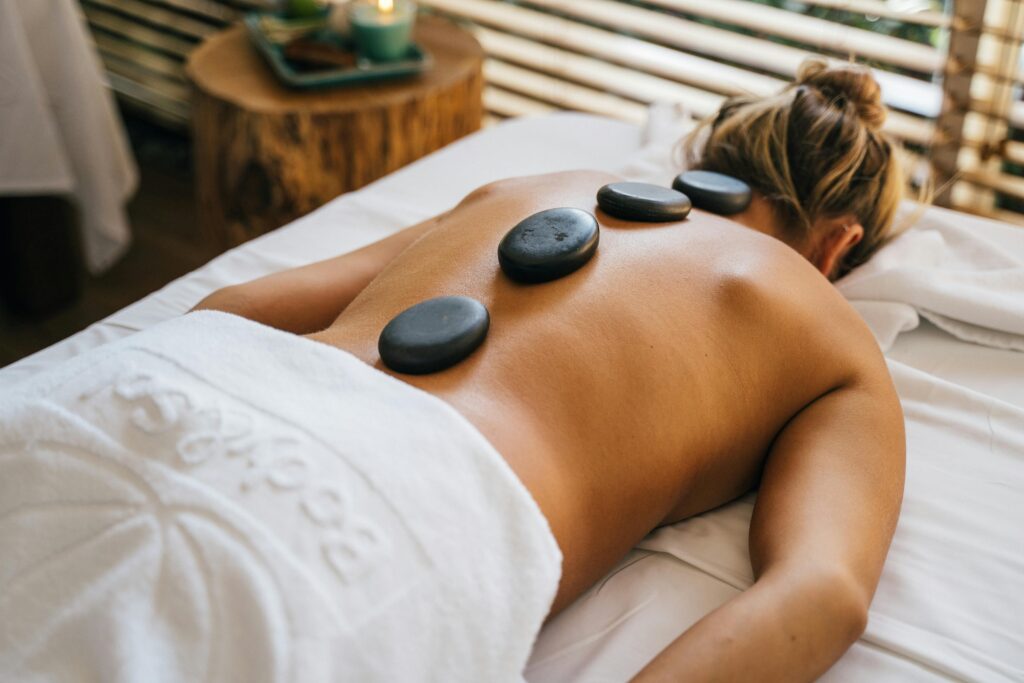 Hot stone massage therapy session at PhysioChiroWellness in Newmarket