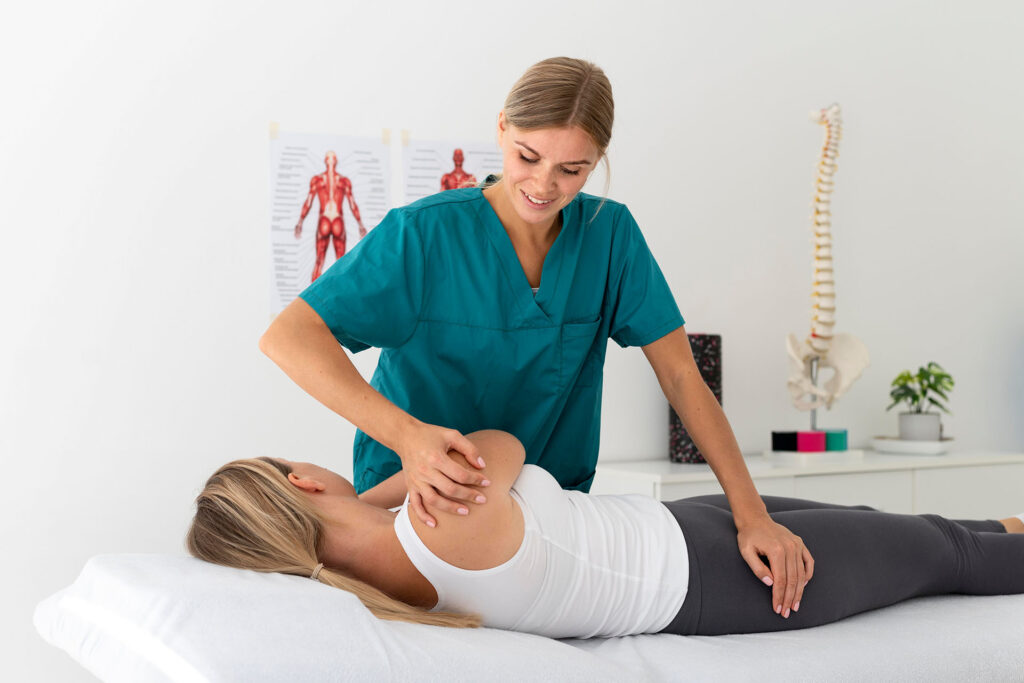 Chiropractor in Newmarket adjusting a patients spine