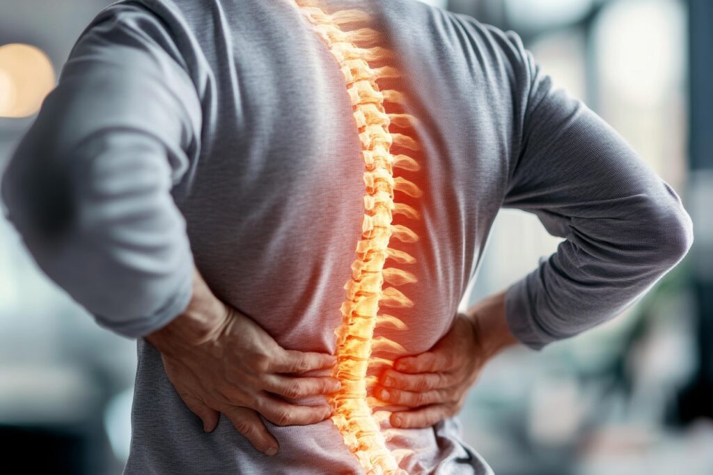 Physiotherapist in Newmarket assessing a patient with a herniated disc lower back pain at PhysioChiroWellness clinic